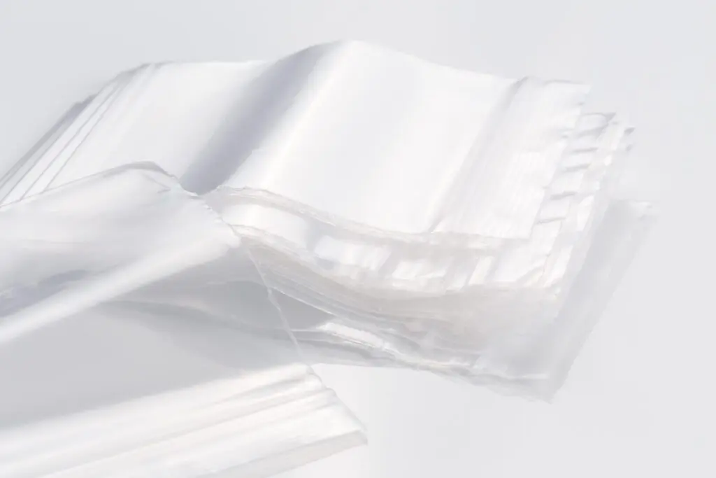 Empty transparent plastic bags on white background, reusable, re-sealable ziplock bags