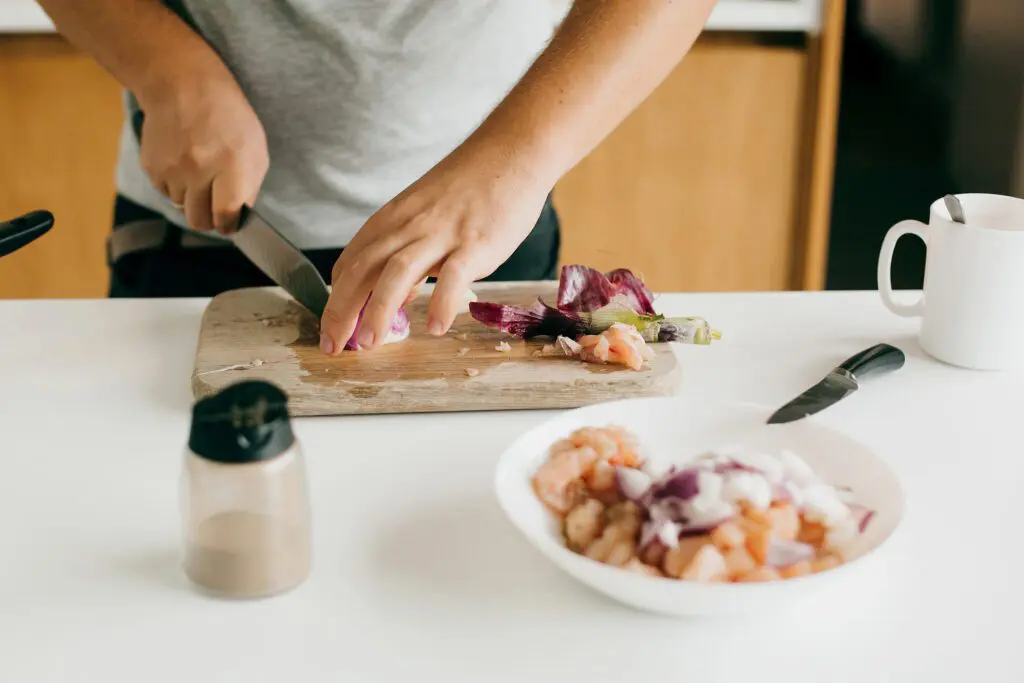 guy cutting with kitchen knife
