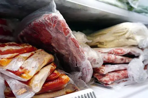 vacuum sealed meat in a freezer